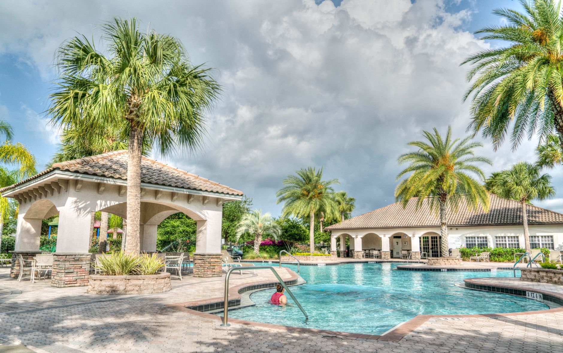A crystal-clear pool serviced by Blue Magic Pools & Spa